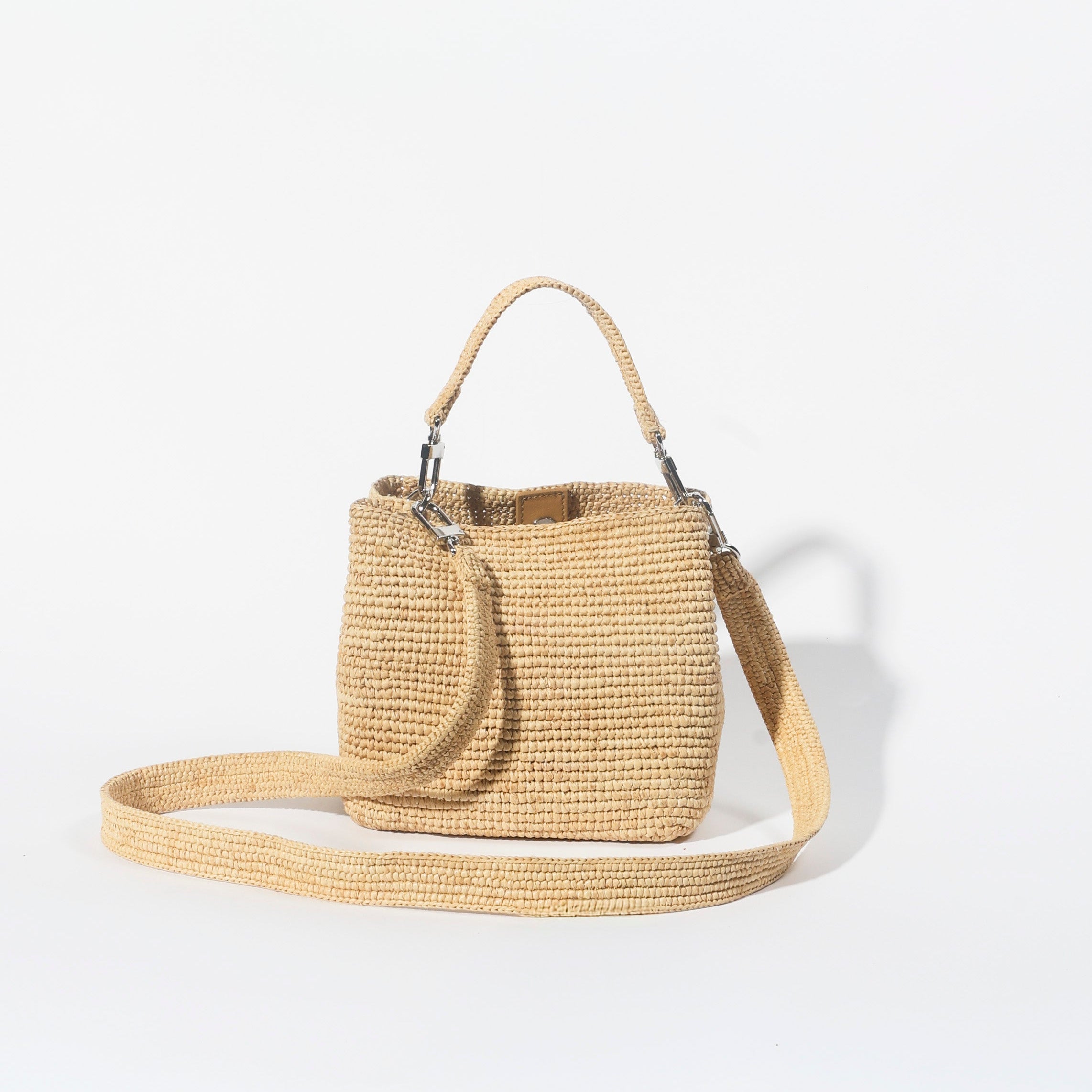 The Sur Mini Tote in Natural raffia with crossbody strap — Cabana Twentynine
