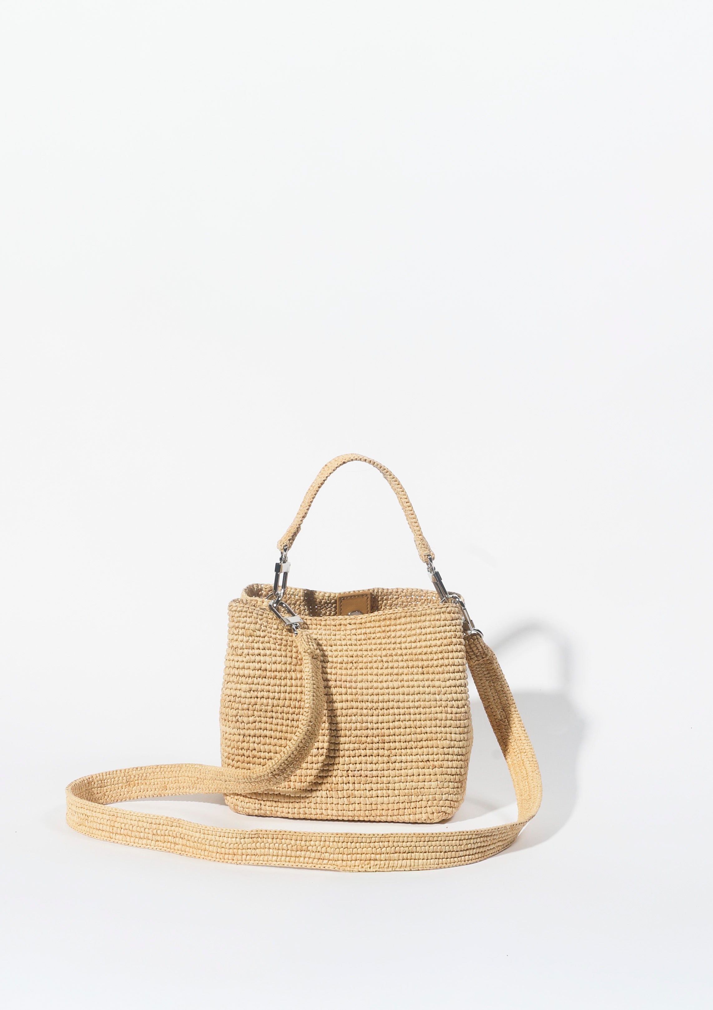 The Sur Mini Tote in Natural raffia with crossbody strap — Cabana Twentynine